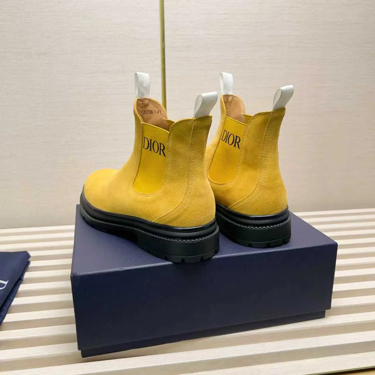 Men's Shoes 💰480 Dior A practical choice that combines protection with classic style. Made from durable Rugged Calf leather, it's tumbled and hand-finished to create a soft suede feel with a rich texture. Elastic side panels and subtle cutouts are inspired by the classic Chelsea boot. Leather upper and lining with Kummel tabs at front and rear, rubber outsole